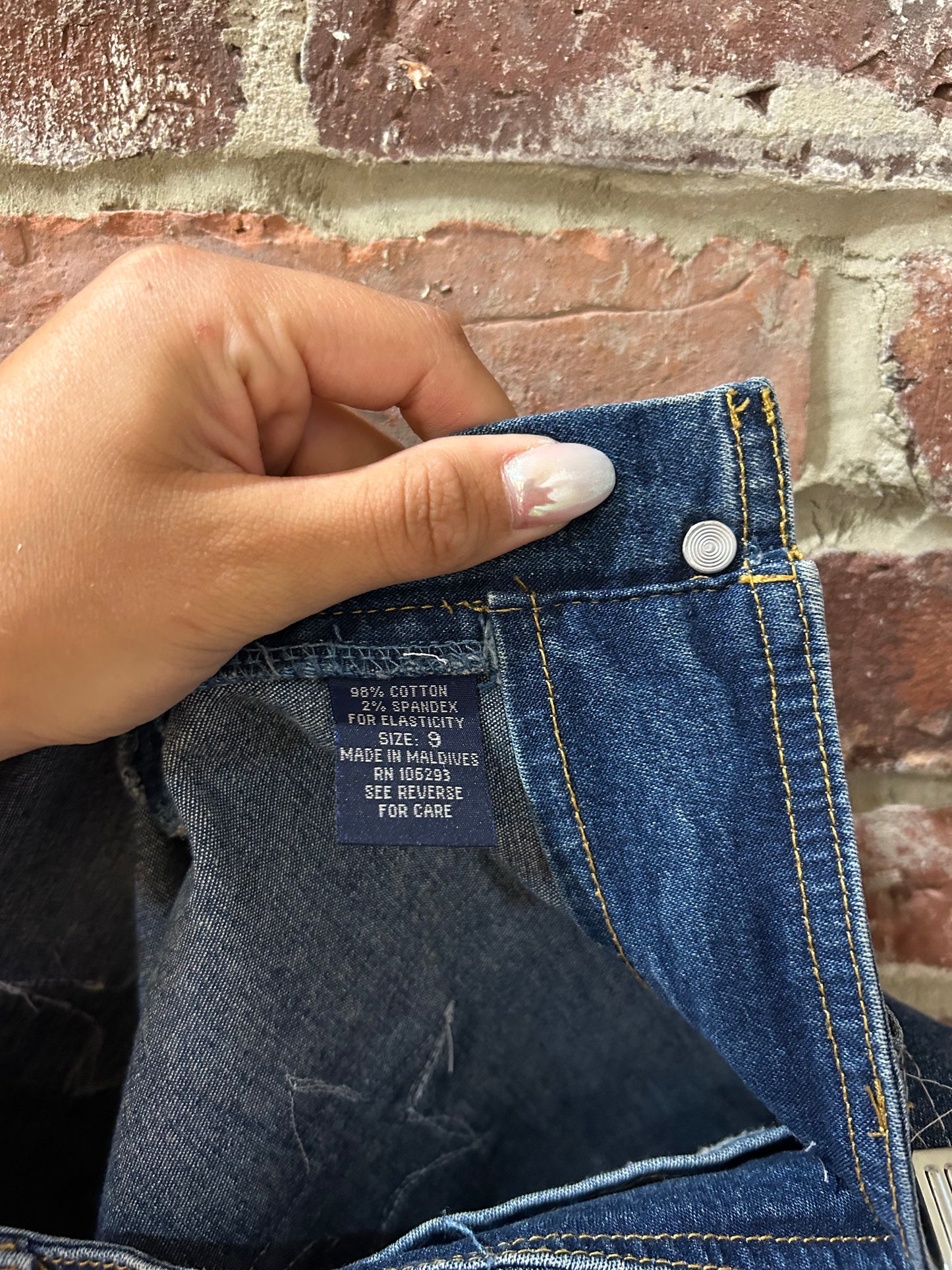 Upcycled, embroidered denim skirt