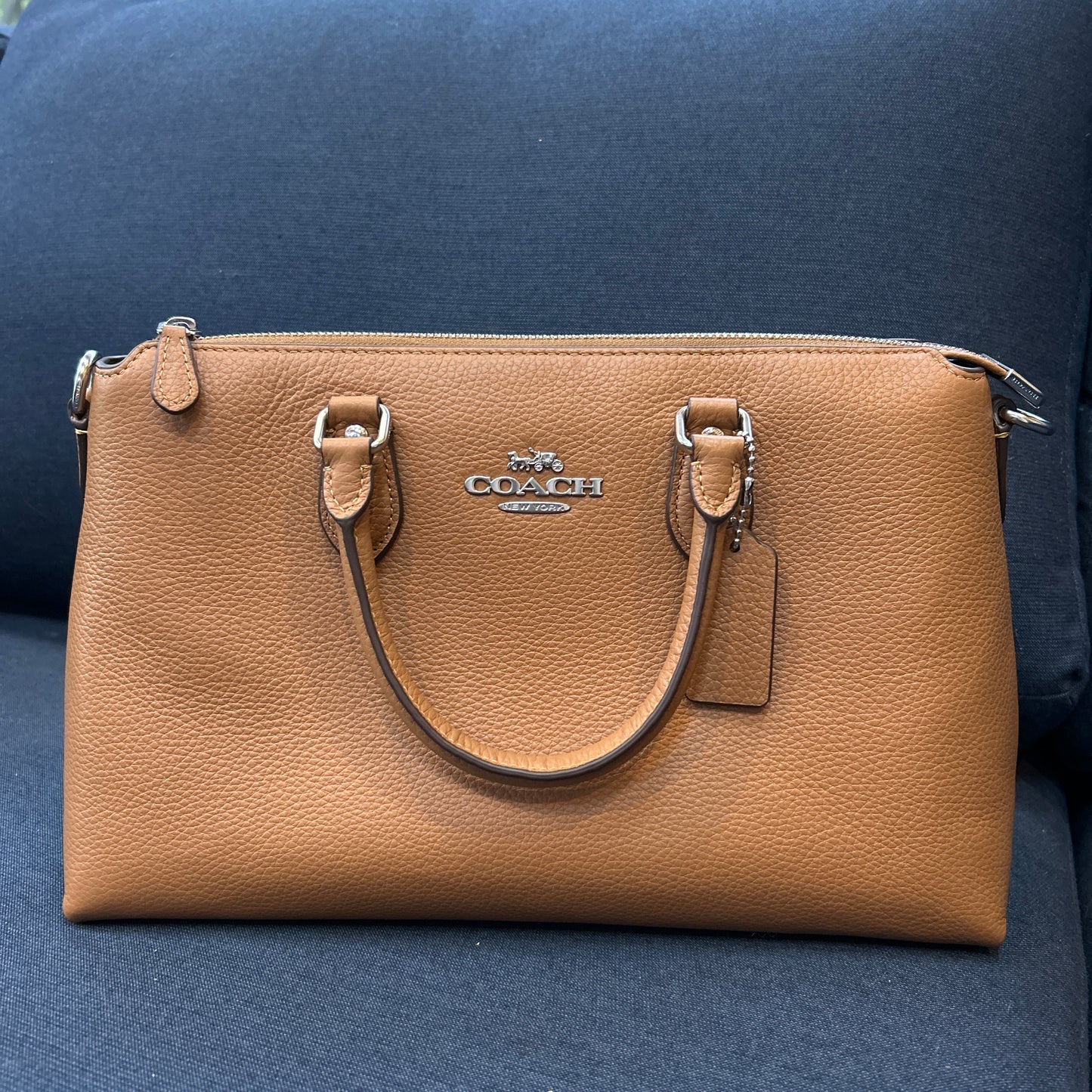 Tan Coach
