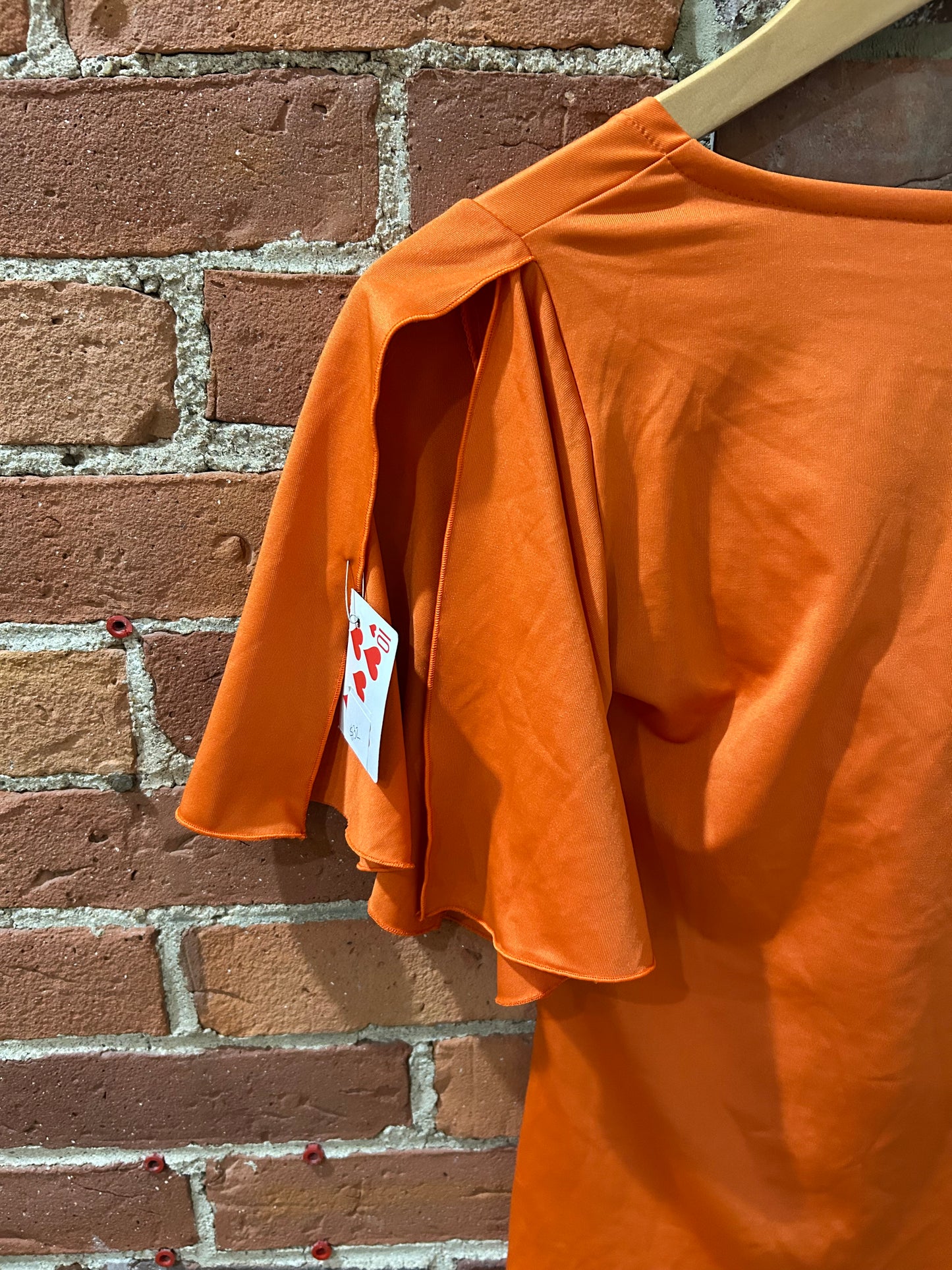Orange V-neck blouse