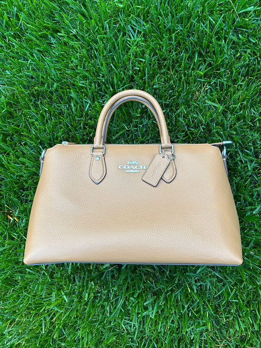 Tan Coach