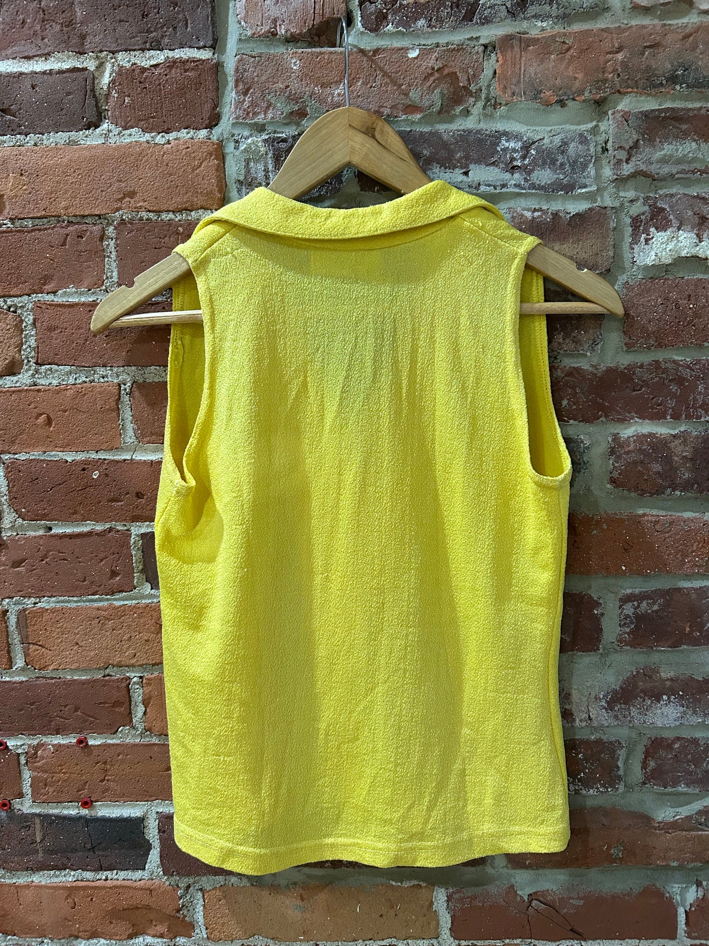 Sleeveless button-up