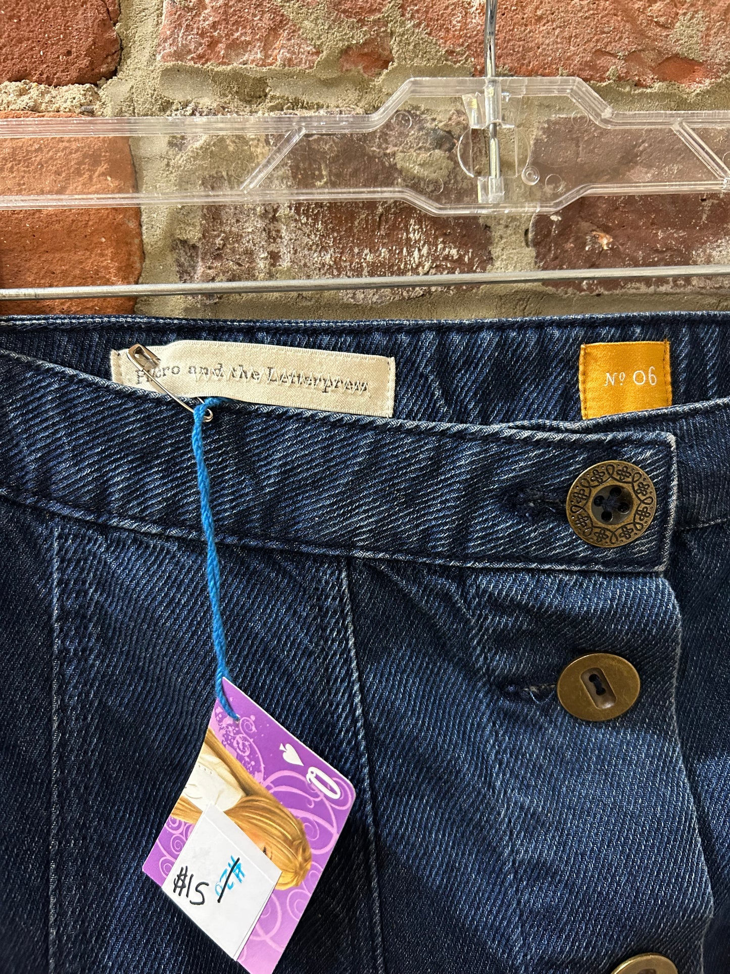 Button-front denim skirt