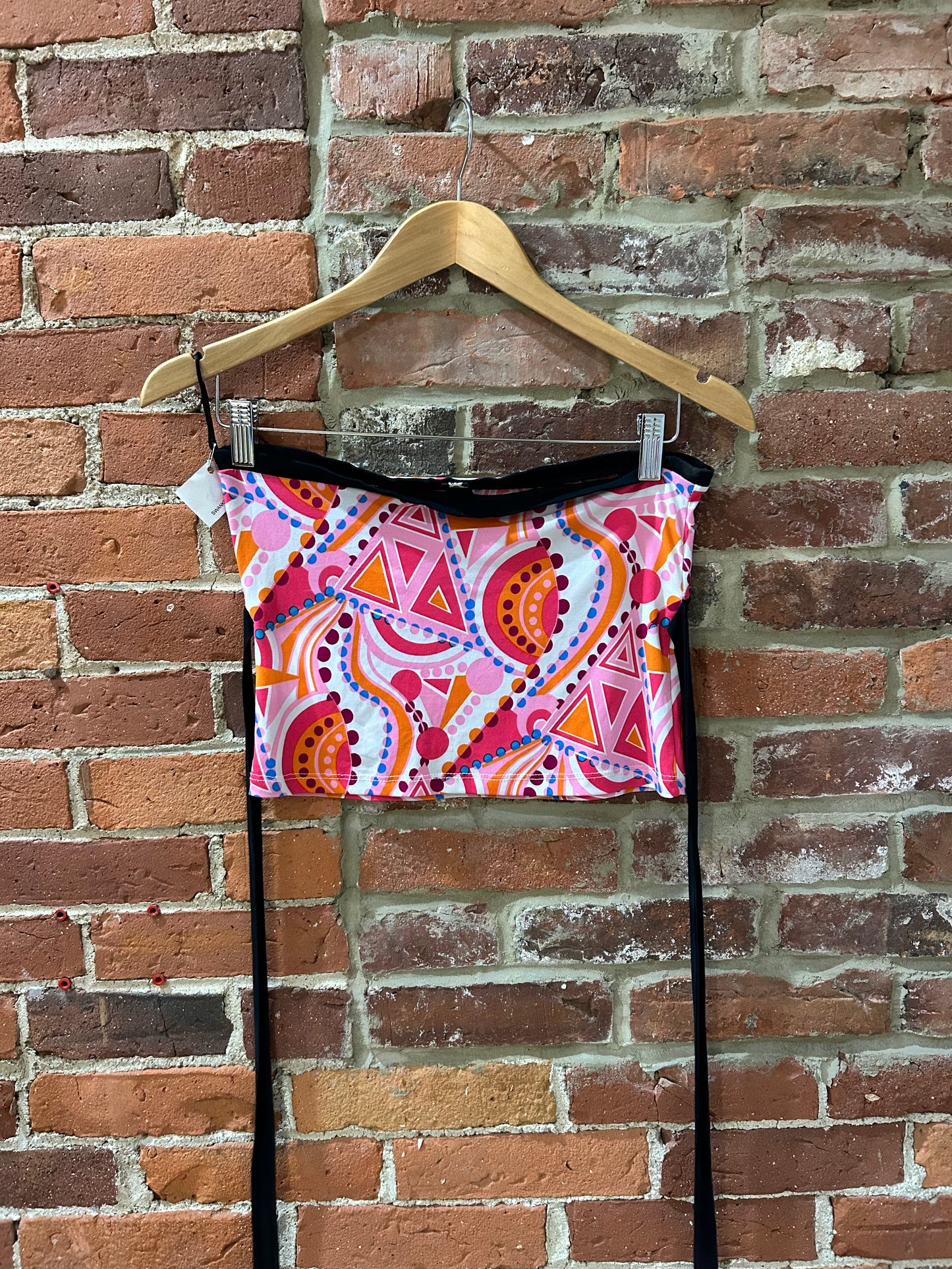 Geometric tupe top