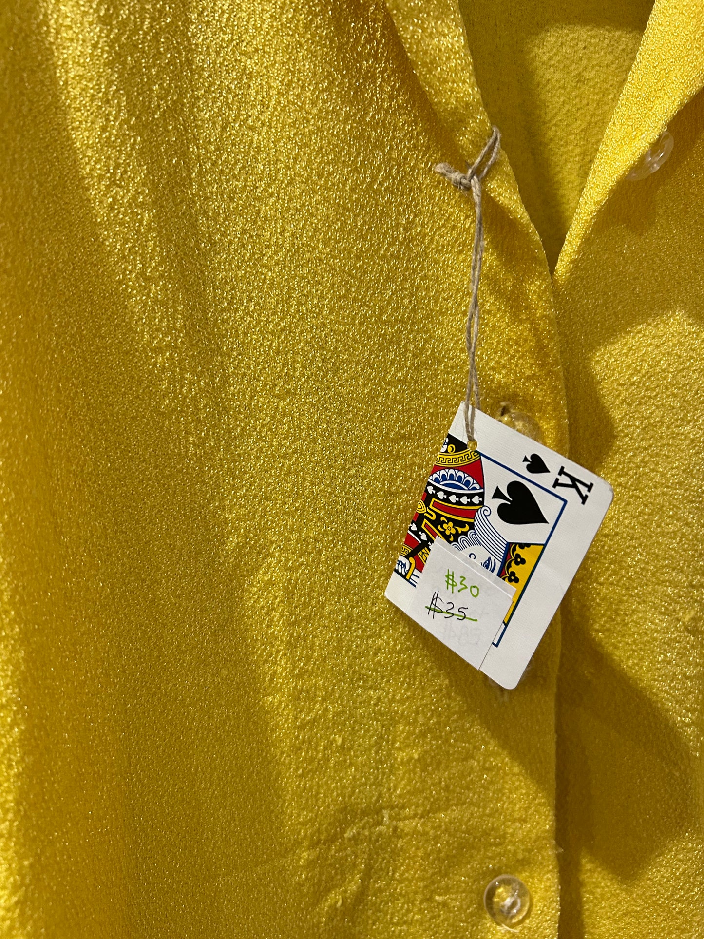 Sleeveless button-up