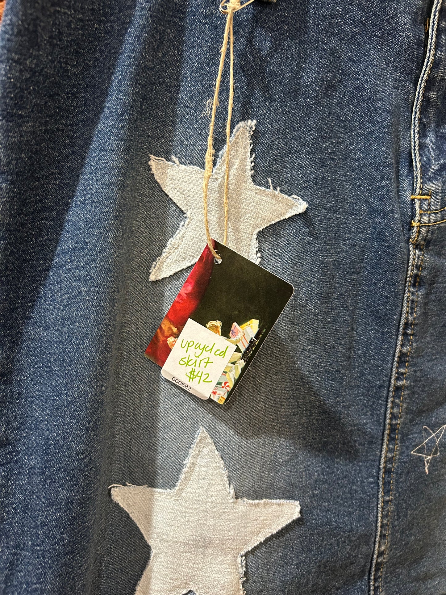 Upcycled, embroidered denim skirt