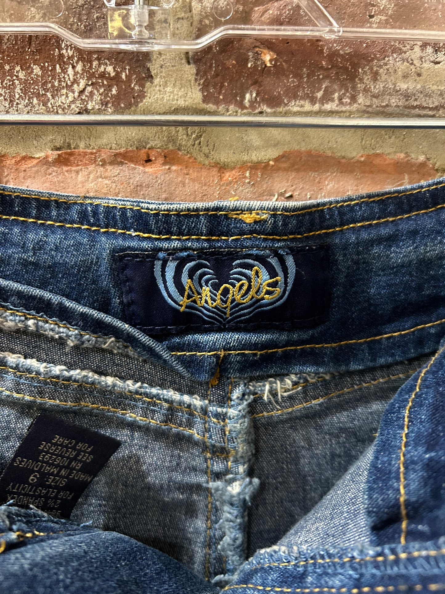 Upcycled, embroidered denim skirt