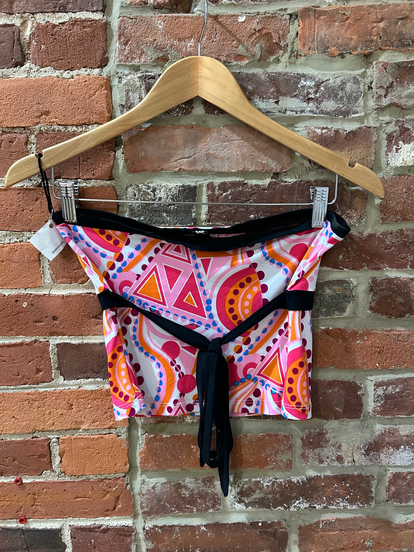 Geometric tupe top