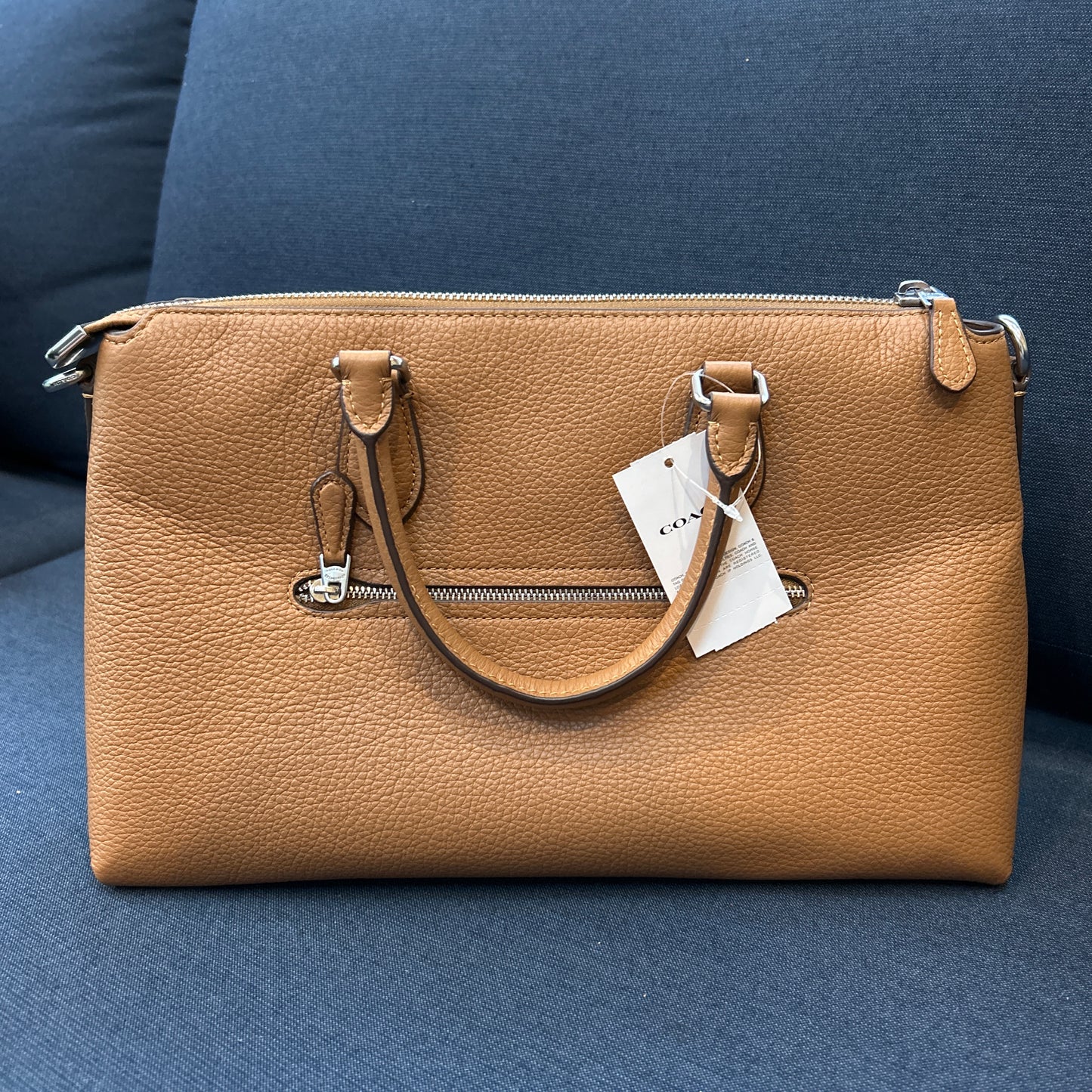 Tan Coach